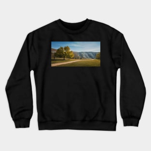 a tree near the country road Crewneck Sweatshirt